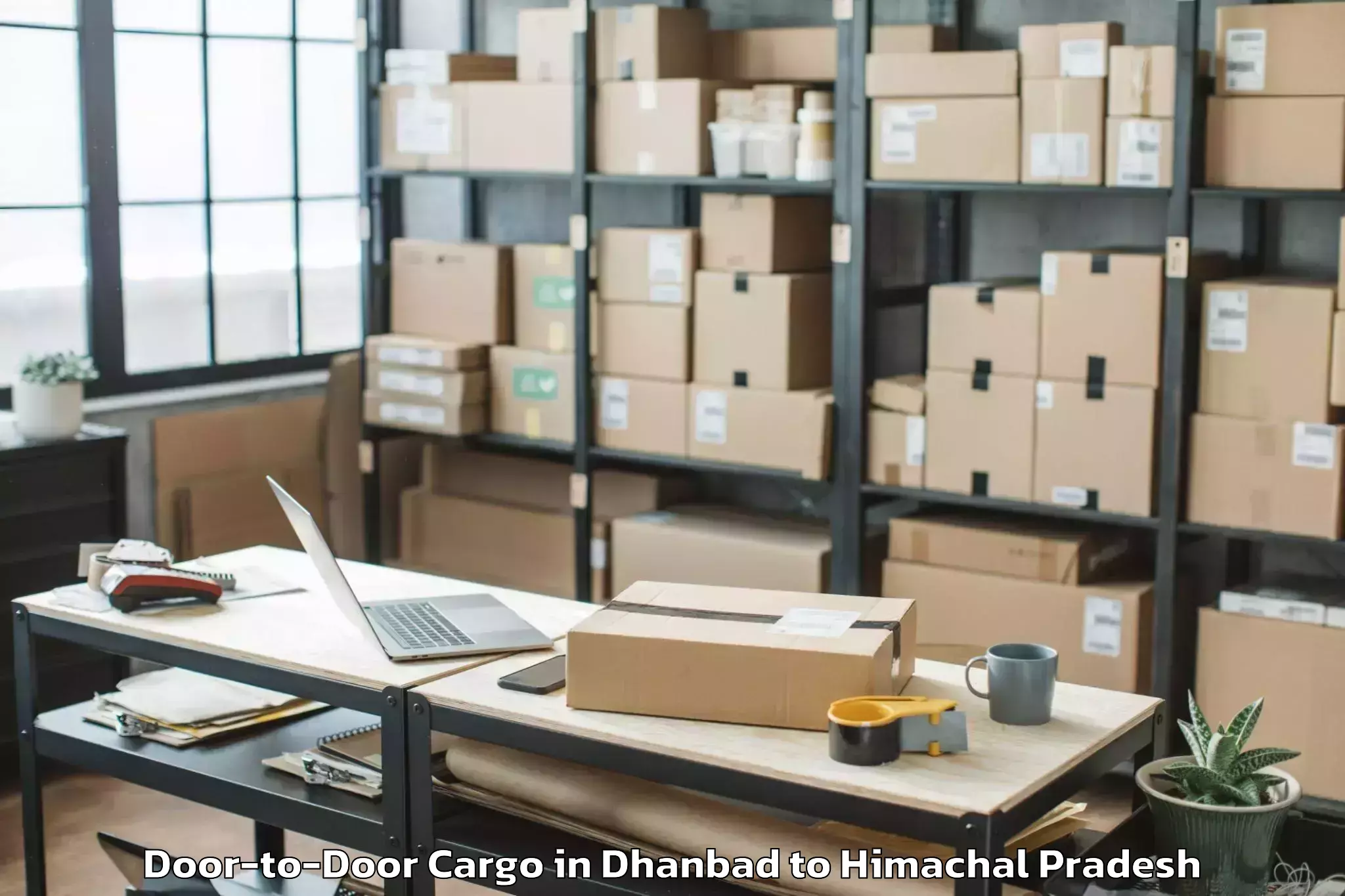 Book Dhanbad to Gaggal Airport Dhm Door To Door Cargo Online